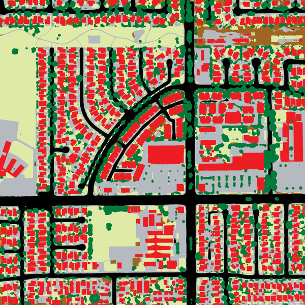 A land-cover classification map, where black lines show roads, red shapes identify land cover, green shapes are trees, gray denotes buildings, and light yellow represents open land.