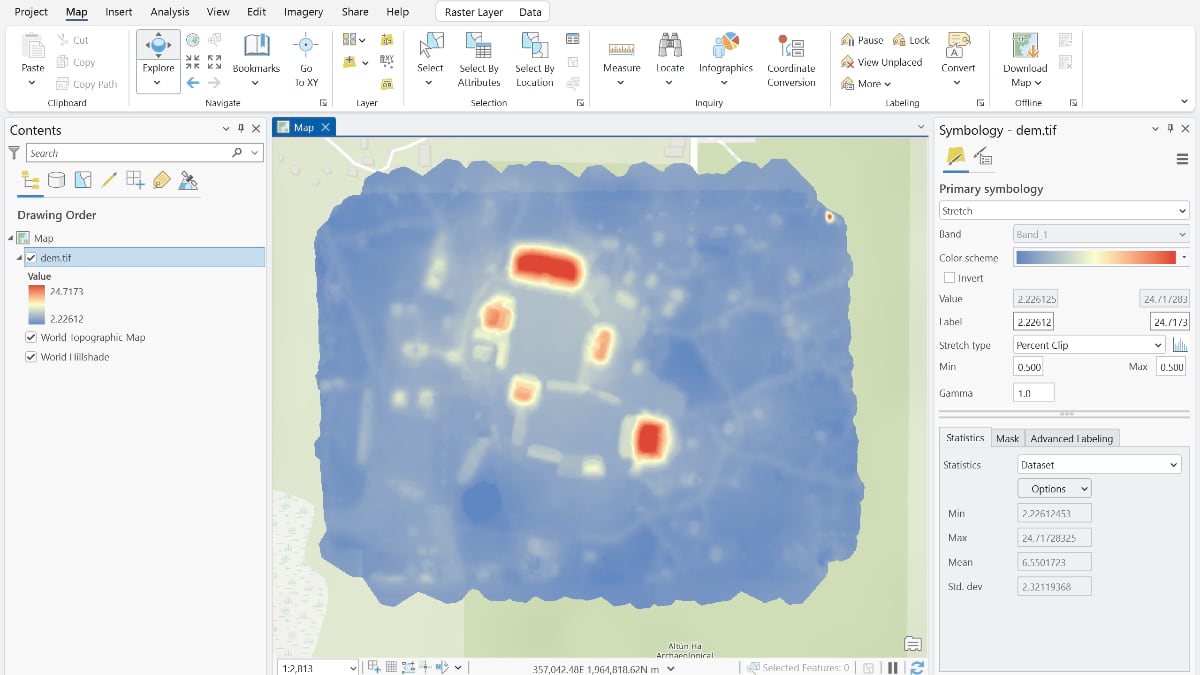 An ArcGIS Pro screen capture showing a digital elevation model of the Altun Ha archaeological site, with warm red and orange tones marking the highest elevations of pyramid structures against a cool blue field representing lower ground.