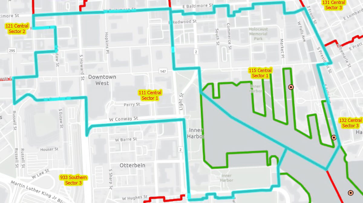 A map of downtown Baltimore shows patrol sector boundaries extending through the Inner Harbor, dividing the water along its center rather than following the shoreline.