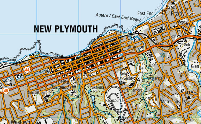 Map of New Plymouth with roads clearly depicted in orange overlaid atop multiple geographical features.