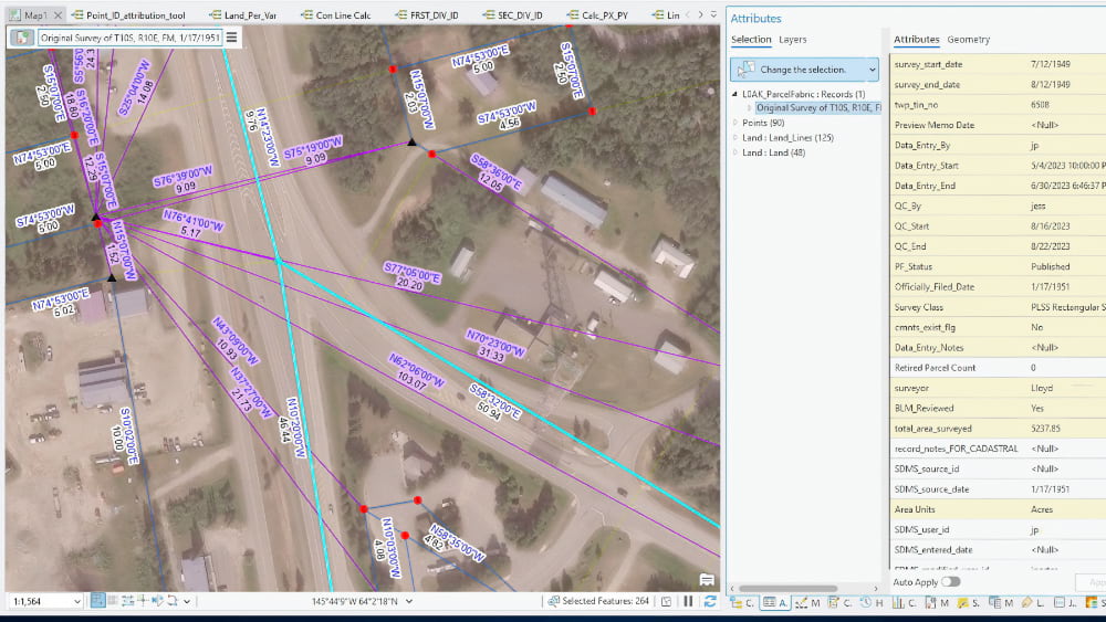 GIS parcel fabric view of an Alaska township survey from 1951, showing surveyor attribution and QC metadata in the attributes panel.