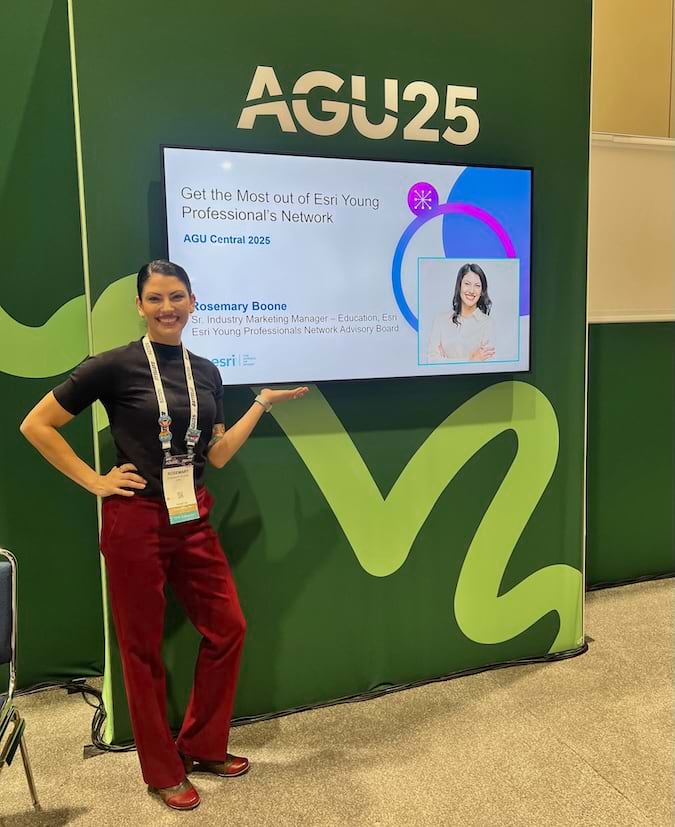 A smiling young woman posing at the American Geophysical Union event