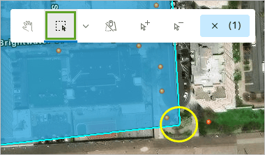 A map of a small area in Brighton Beach with red data points scattered and a yellow circle in the corner