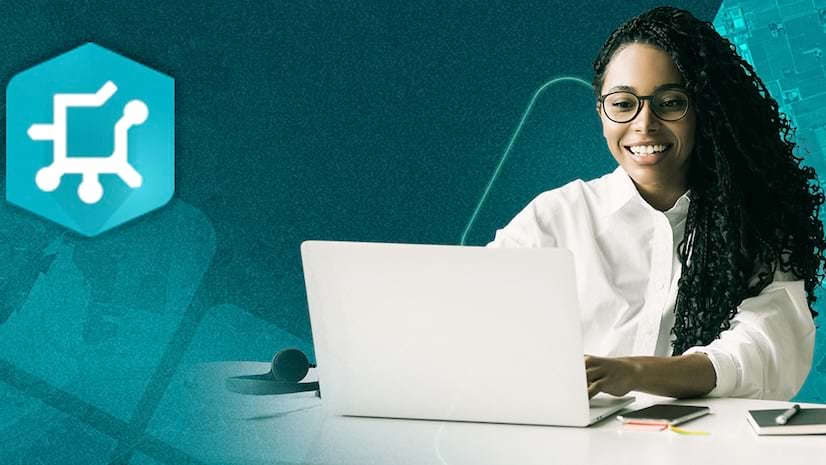 A smiling young woman typing on a laptop against an abstract blue background