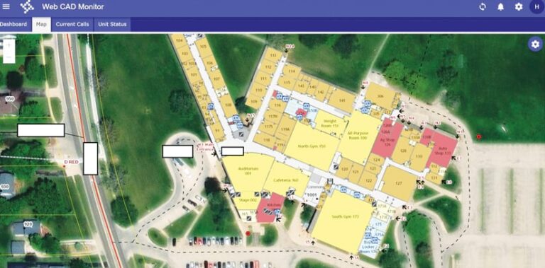 A screenshot of the Web CAD Monitor displaying an aerial view of a large building with a color-coded floor plan. Rooms are labeled with names and numbers, including "Auditorium 001," "North Gym 150," and "Auto Shop 133."