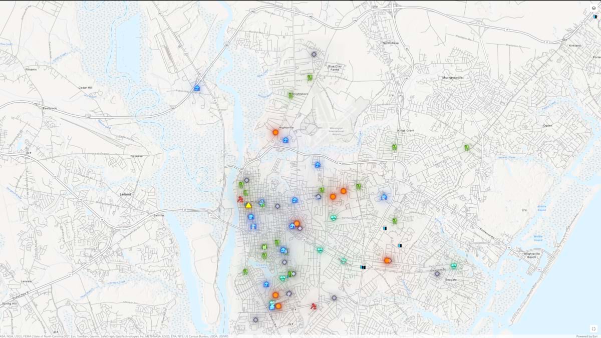 Map of Wilmington showing clustered icons for food access and service locations.