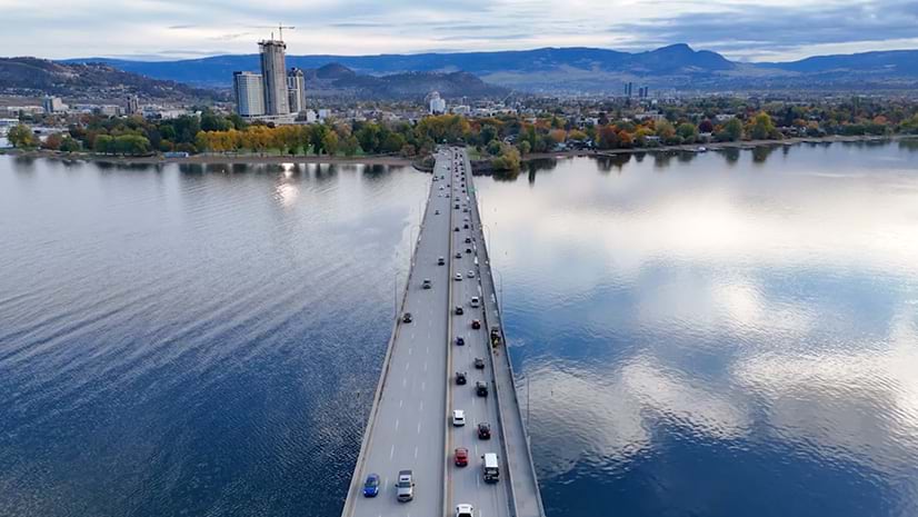 A highway across a body of water in Kelowna, British Columbia, Canada, on a sunny day