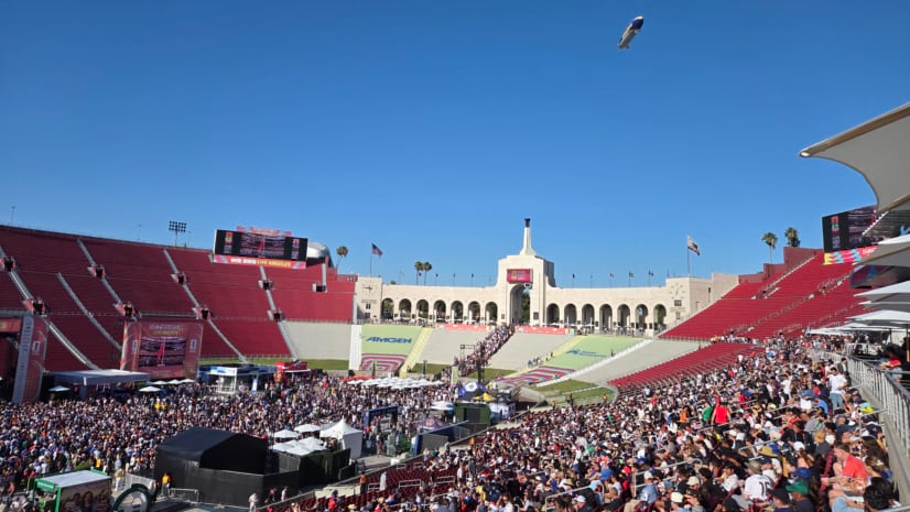 Crowded stadium seating bowl at the LA Memorial Coliseum under a clear sky during the FIFA Fan Festival. Credit: Phyllis Tan, LA County Department of Public Health.