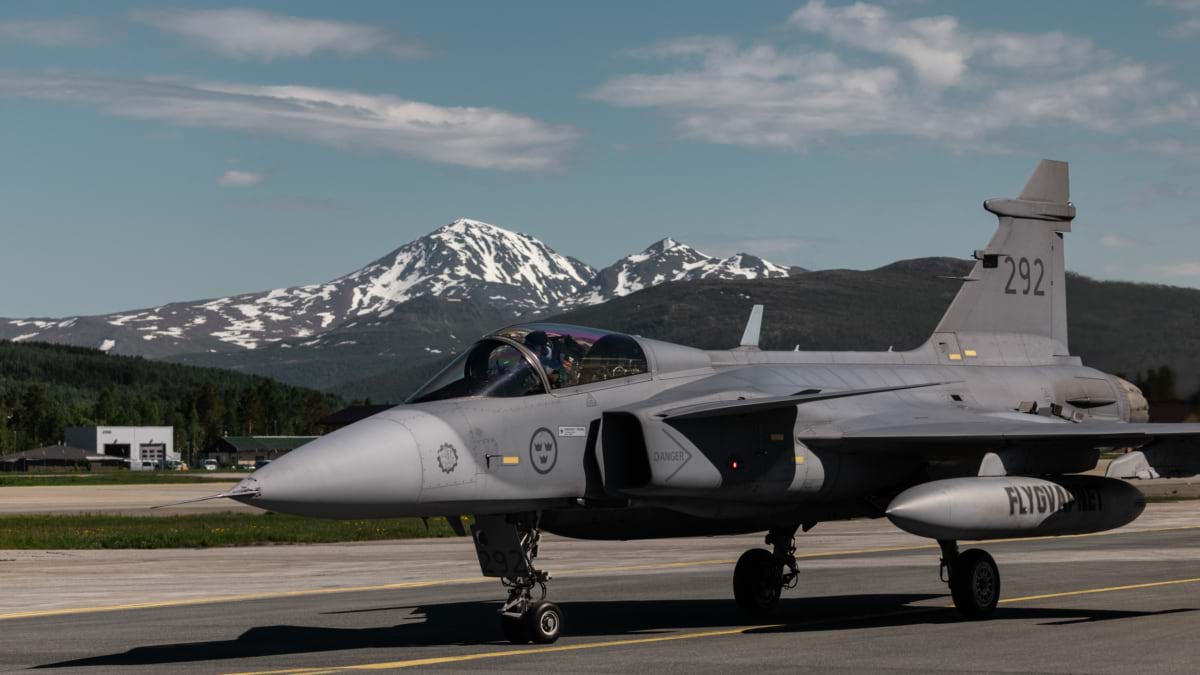 A Swedish fighter jet taxis on a runway at an air base in northern Norway during a NATO exercise.
