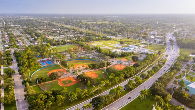 Aerial view of a Palm Beach County high school campus with athletic fields.