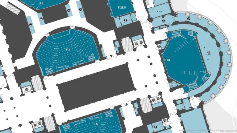 An indoor building map in blue, black, and white featuring building numbers, doors, and seats