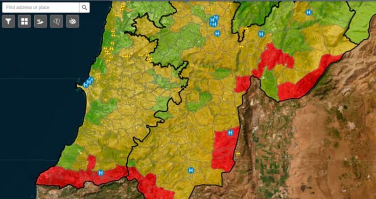 Digital map of a coastal area with regions shaded red, yellow, or green and outlined in black. Blue circles with white 'H' icons mark locations on land. A search bar and control buttons appear in the top left corner.