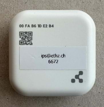 A small white square representing a bluetooth beacon