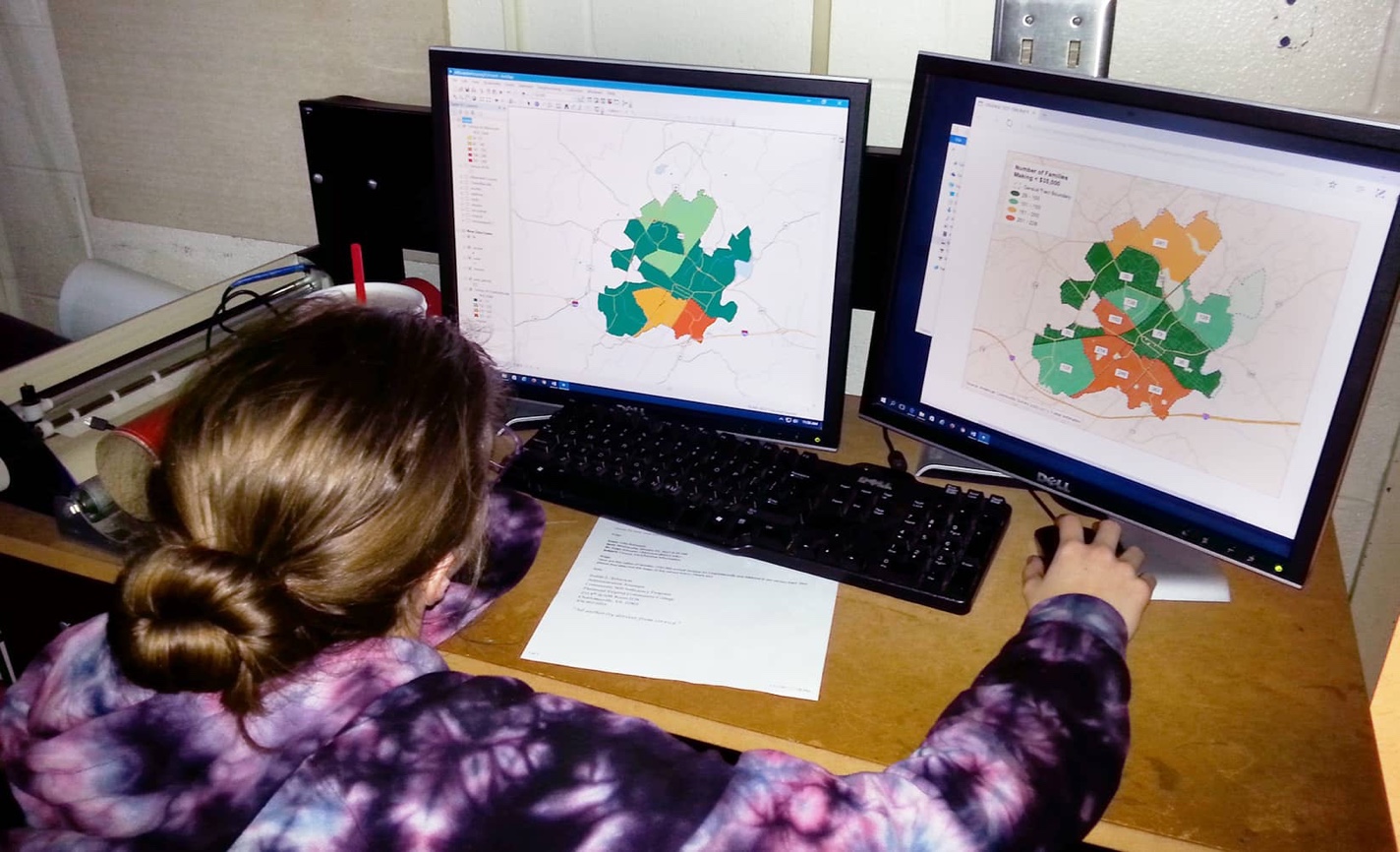 A student works on a map.
