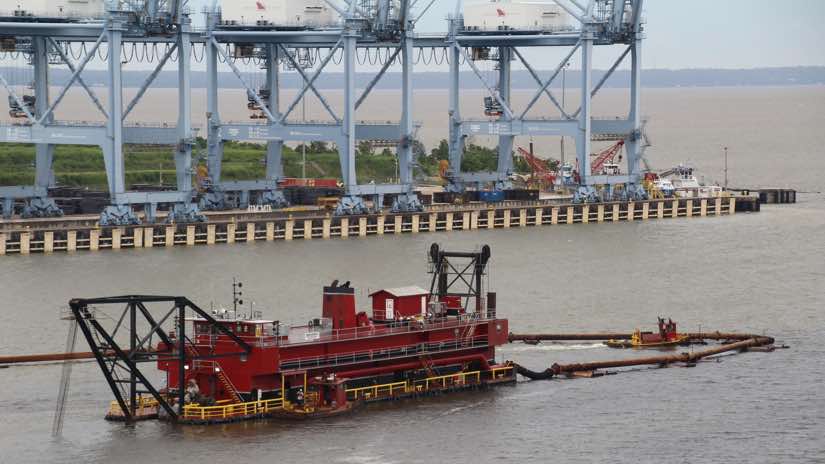 The cutter-head dredge Missouri H works to remove sediment in the Port of Mobile, Alabama.