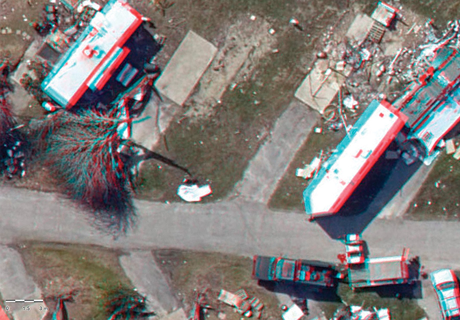 With stereo orthoimagery, which is viewed with 3D glasses, users got a better idea of where the storm knocked down trees or winds ripped the roofs off houses. (Imagery courtesy of Vexcel Imaging.) With stereo orthoimagery, which is viewed with 3D glasses, users got a better idea of where the storm knocked down trees or winds ripped the roofs off houses. (Imagery courtesy of Vexcel Imaging.)
