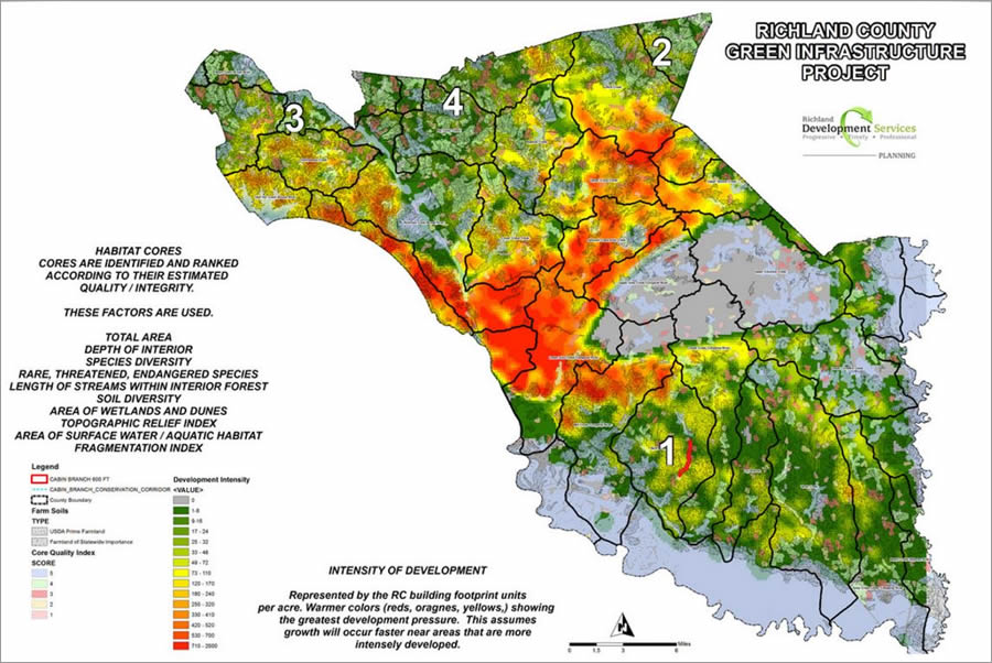 The areas on this map shaded in red, orange, and yellow, are more developed than the green areas.