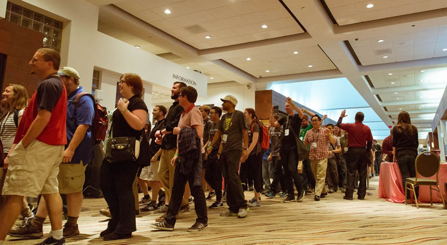 A long line of developers walk through the Palm Springs Convention Center. More than 1,800 people attended the event in Palm Springs.