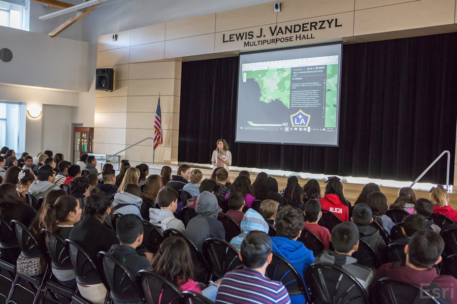 Students pack the Lewis J. Vanderzyl Multipurpose Hall at Central Middle School in Riverside to hear Bell speak about geography and mapping