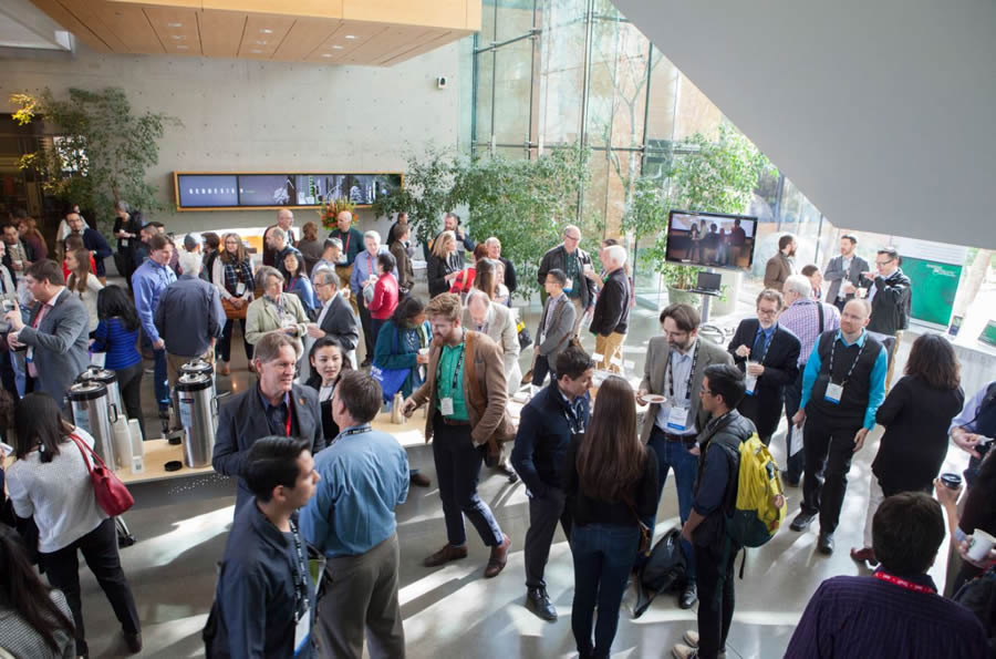 Attendees chat during a break at the Geodesign Summit, which was held at Esri headquarters in Redlands, California.