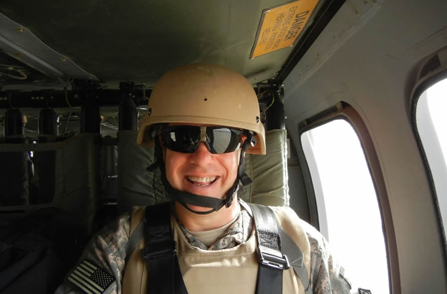 John Berry rides in a Blackhawk helicopter over central Iraq.