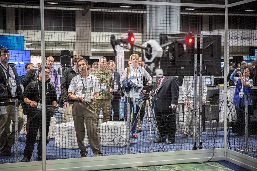 Drones will maneuver inside a netted cage at the Esri Imaging & Mapping Forum.