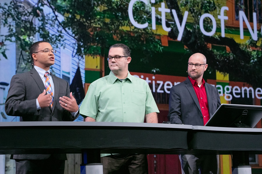 Lamar Gardere (left), J.B. Raasch, and Gregory Hymel from the City of New Orleans talk about how they use Esri technology to spur citizen involvement in making the city a better place to live.