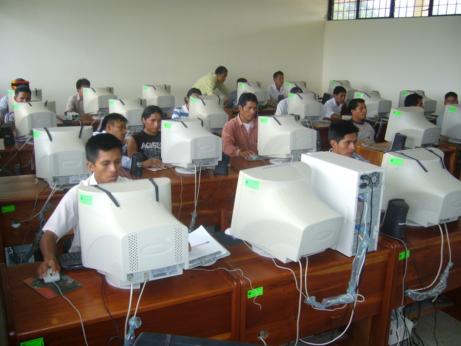 A group of indigenous students learn to use GIS at the AmazonGISnet lab. Photo courtesy of AmazonGISnet. A group of indigenous students learn to use GIS at the AmazonGISnet lab. Photo courtesy of AmazonGISnet.