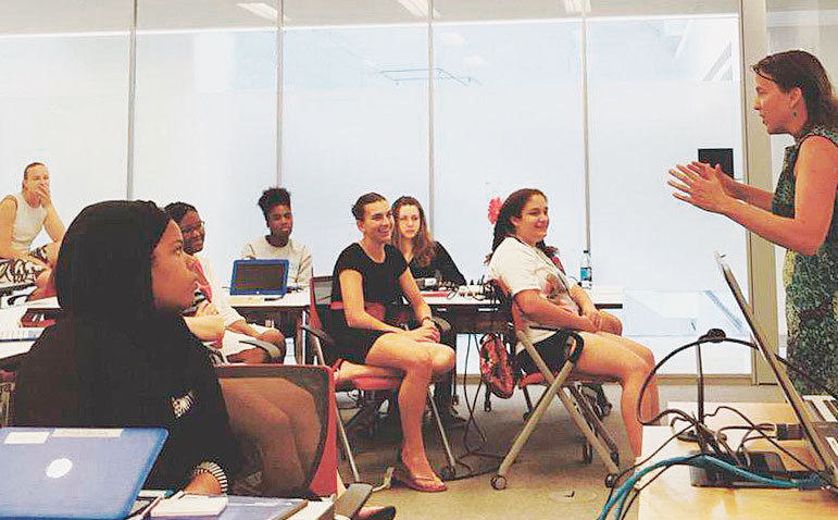 Dr. Coline Dony (far left) led a Girls Who Code Summer Immersion Program in Washington, DC, which National Public Radio's lead developer, Joanne Garlow (right), joined as a guest. (Photo courtesy of Coline Dony.)