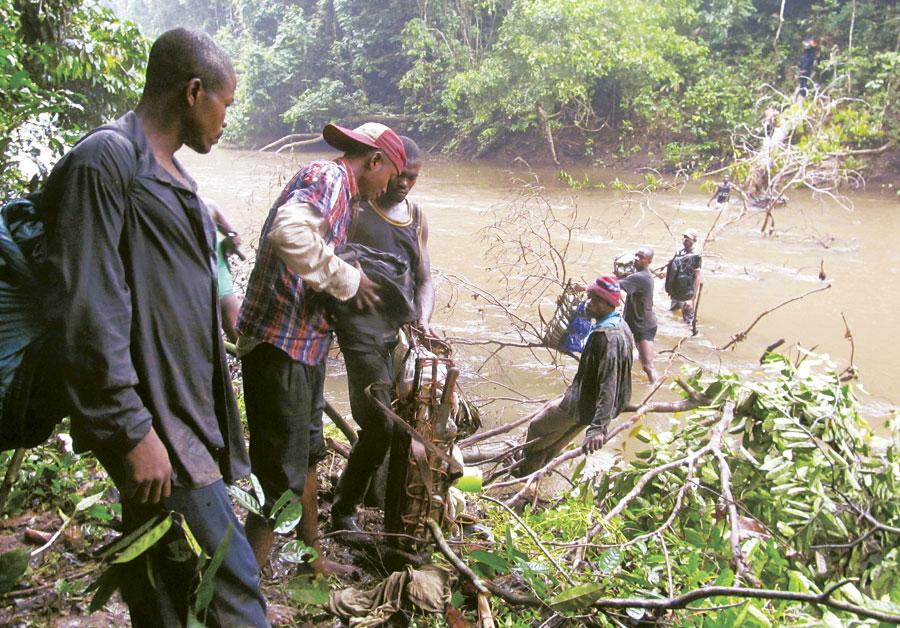 Congolese field biologists used GIS to collect field data all over this unexplored wilderness—sometimes having to form human supply chains to get all their materials across rivers.