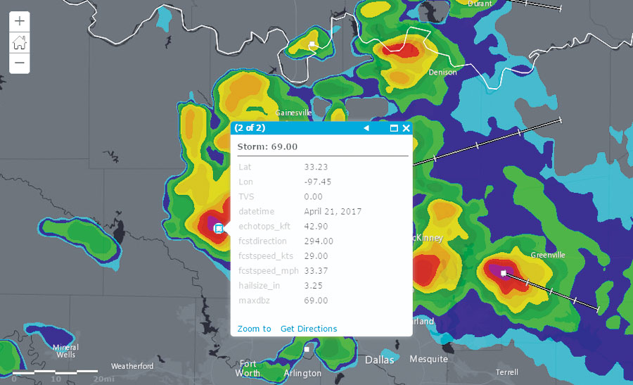 Overlaying storm motion vectors (the white lines with tick marks) onto radar data with storm attributes lets users see where a storm is moving and how fast.