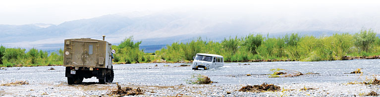 Research vehicles must ford rivers to reach some remote sampling sites in Mongolia. (Photo courtesy of Alain Maasri.) Research vehicles must ford rivers to reach some remote sampling sites in Mongolia. (Photo courtesy of Alain Maasri.)