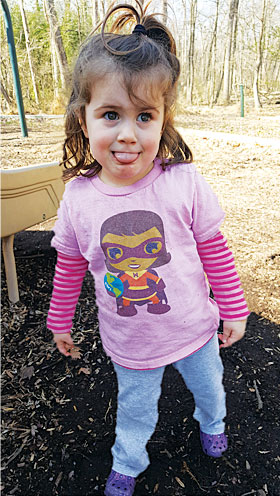 Two-year-old Lena, is wearing a Map Girl Esri T-shirt