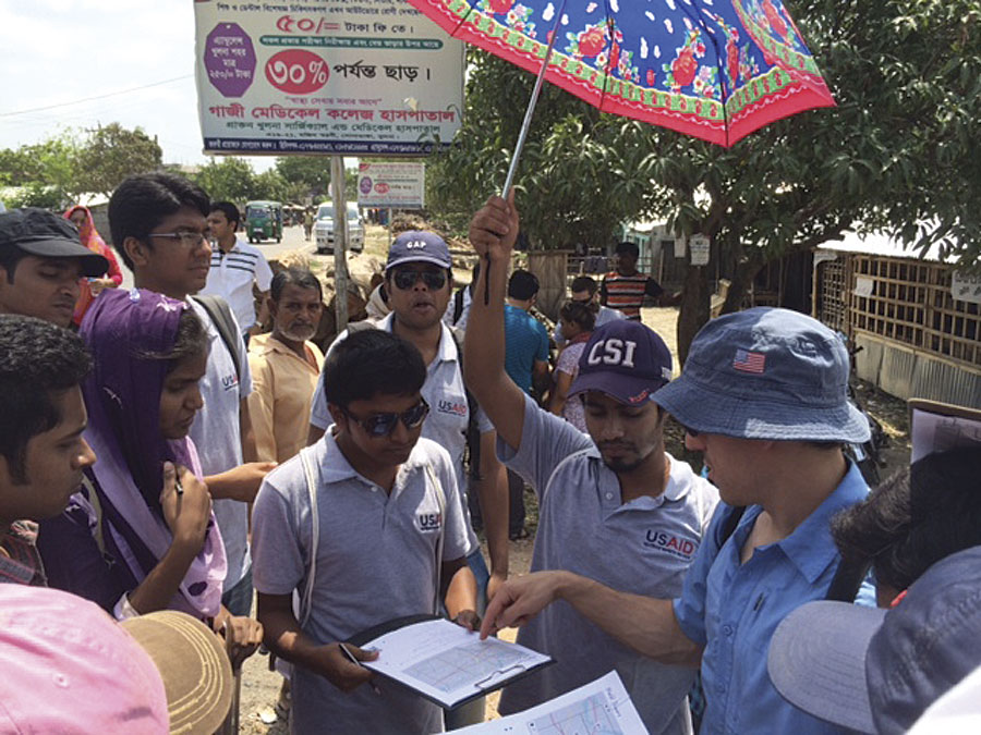 Chad Blevins from the USAID GeoCenter traveled to Bangladesh, where he provided instruction to Khulna University students as they prepared for a day of field mapping. Photo/Michael Crino
