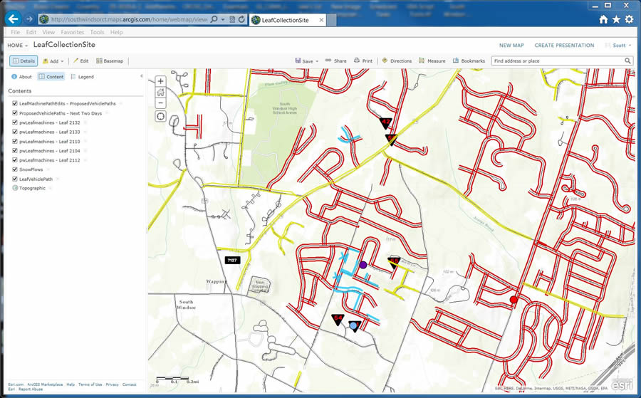 The streets in red show where leaves have already been collected, while the streets marked in yellow show where leaves will be collected during the next two days. The blue lines indicate where the map is being edited to show updates as the leaf collection vehicles—indicated by the purple, blue, and red dots—move through the neighborhoods gathering leaves.