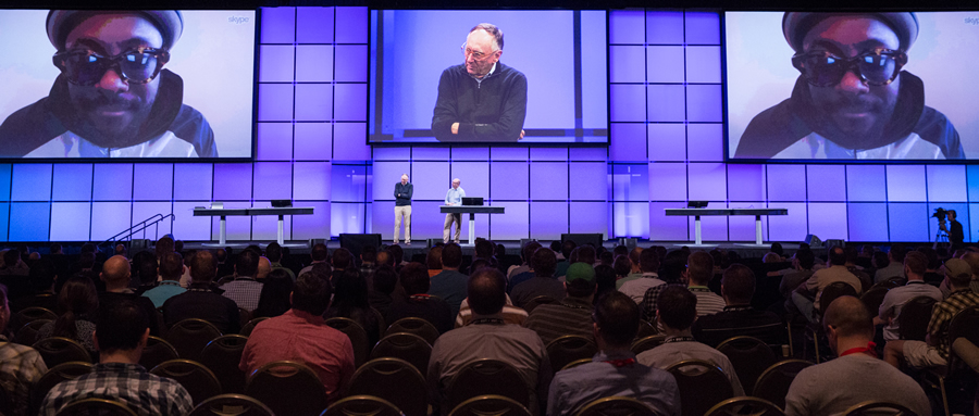 Esri president Jack Dangermond and his friend, will.i.am, teamed up onstage to call on developers to become geo-mentors.