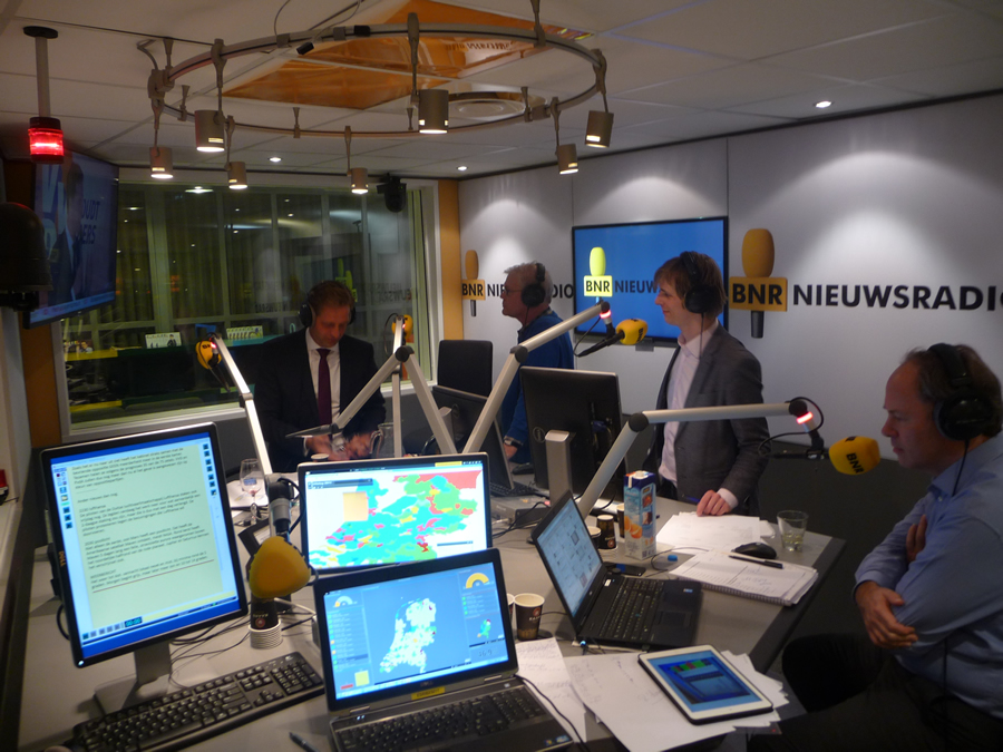 Inside the BNR Nieuwsradio studio, computer screens displayed the election results using maps and widgets created with Esri's Operations Dashboard for ArcGIS.