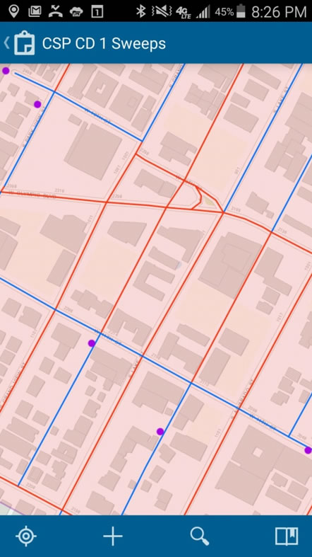 In this map in the Collector for ArcGIS app, the streets in blue have been inspected for abandoned waste while the streets in red remain to be inspected.