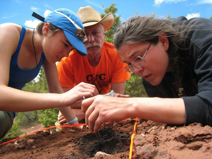 Morgan Robins (left), a GIST/archaeology student, Todd Guenther (center), a CWC archaeology faculty member, and GIST/archaeology student Starla Ramirez (right), conduct archaeological field work. Students from the CWC archaeology program use ArcGIS to prepare maps for the US Bureau of Land Management, which funds their summer field work.