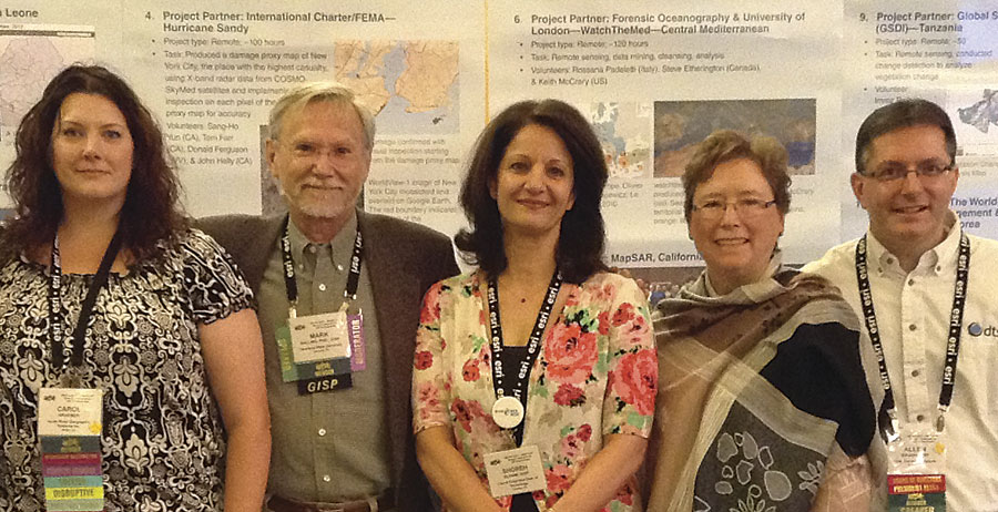 Shoreh Elhami (center) with GISCorps Core Committee members (from left to right) Carole Kraemer, Mark Salling, Dianne Haley, and Allen Ibaugh. Shoreh Elhami (center) with GISCorps Core Committee members (from left to right) Carole Kraemer, Mark Salling, Dianne Haley, and Allen Ibaugh.