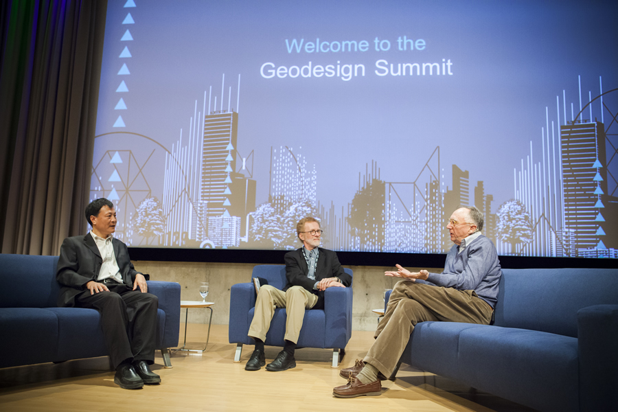 Kongjian Yu (left), the founder of Turenscape, speaks with Tom Fisher (center) and Jack Dangermond about the importance of creating an ecological infrastructure.