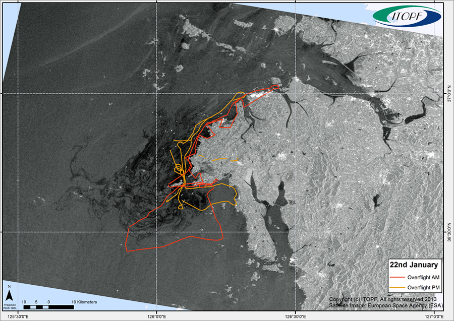 An aerial surveillance map shows a satellite image of an oil spill site and the flight paths of surveillance planes.