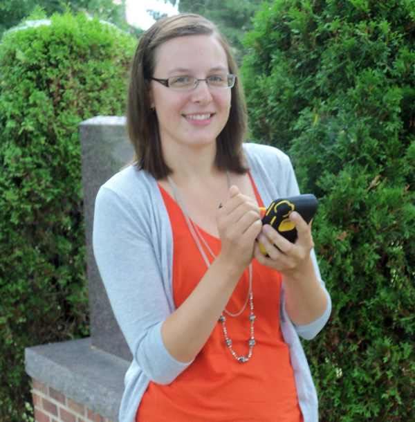 Katie Wiederholt collects a GPS point using a Trimble device. Photo by Troy Maggied.