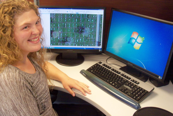 Cassie Jorgenson uses ArcGIS to map East Side Cemetery. Photo by Troy Maggied.