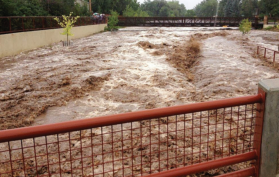 Streams and rivers surged, overrunning banks and affecting bridges and pathways throughout Colorado in September 2013.