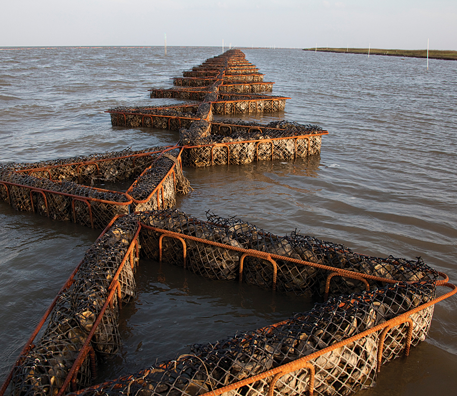 Alabama oyster reef installed with booms. Alabama oyster reef installed with booms.