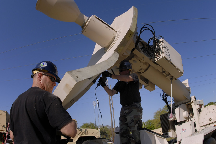 Master Sergeants Troy Wilkerson and Ed McManus prep Eagle Vision's satellite antenna to receive raw imagery for processing. (Photo by Senior Master Sergeant Edward E. Snyder and courtesy of www.nationalguard.mil)