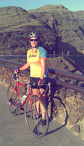 Christine Chaplin a GIS technician shows her Esri bike jersey