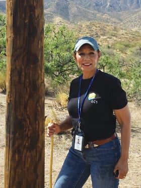 Eva Hinojosa wore her Esri T-shirt while groundtruthing a customer’s job in rattlesnake country
