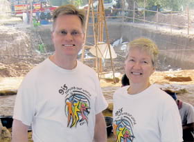 Brian Hall and Kathryn Scott show their matching Esri T-shirts in Phimai, Thailand